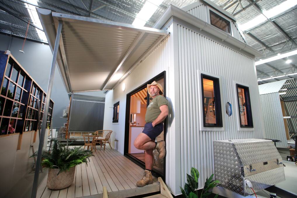 Relaxation personified: Rick Smith shows off one of his Havenwood tiny homes at Albion Park Rail. Pictures: Sylvia Liber.