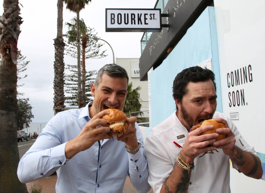 Burgers and more: Andrew Harrison and Shane Debnam try out some of the burgers they are planning to serve near North Beach. 
