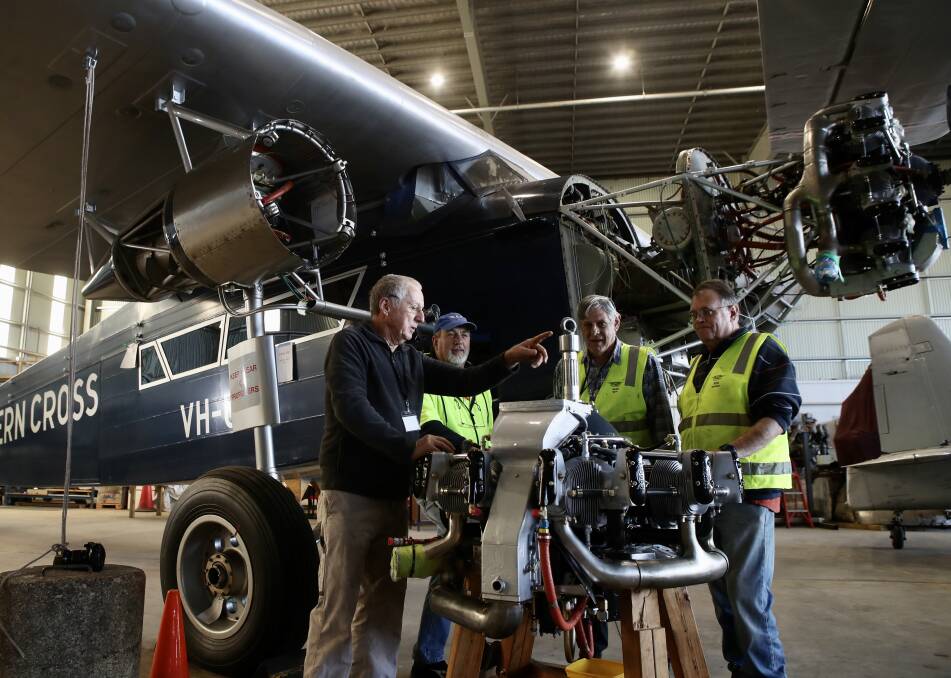 Home run: Jim Thurstan, Brian Van Bragt, Alex Brown and Rod Richardson have been installing the restored engines on the Southern Cross II when they arrive. Picture:Adam McLean.
