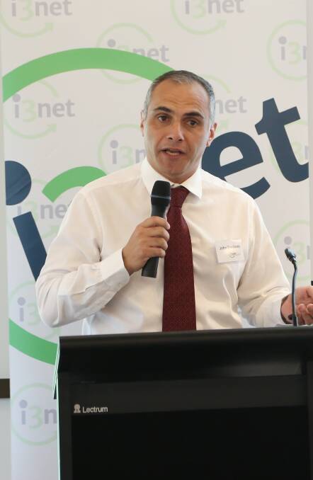 Campus of opportunity: University of Wollongong Facilities Management director John Dardano speaking at i3net on Friday. Picture: Greg Ellis.
