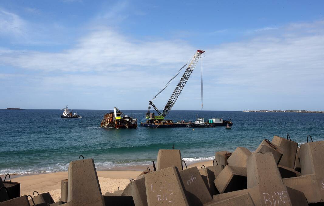 Early stages of the Oceanlinx wave energy generator removal at Port Kembla in September 2016. Pic Robert Peet
