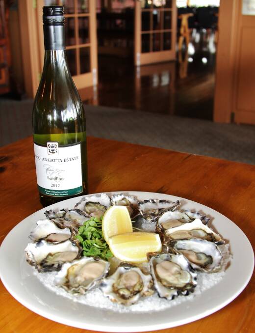 Winning combination: Semillon and oysters in Alexander's Restaurant at Coolangatta Estate. Picture: Greg Ellis.
