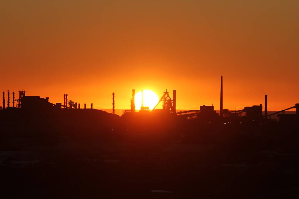 New dawn: Port Kembla Steelworks at sunrise. Picture: Greg Ellis.
