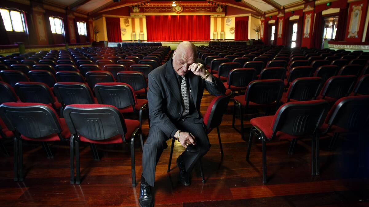 Moving tribute: John Comelli sheds a tear as he talks about his late wife Anita Comelli after renovating King's Theatre in Thirroul and renaming it Anita's Theatre. 
