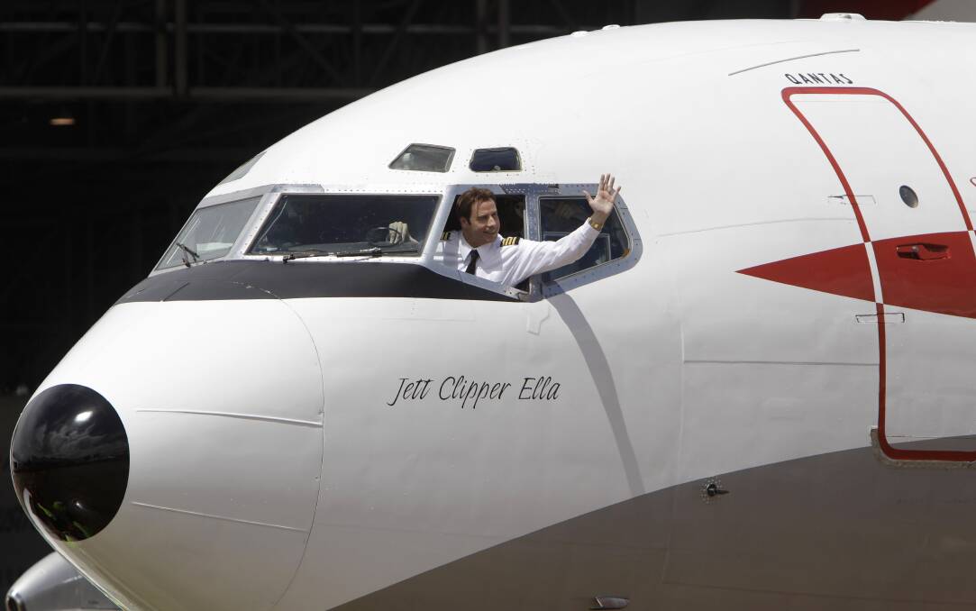 Travolta coming to Albion Park: An image Illawarra fans of Hollywood actor John Travolta can look forward to in 2018 when he flies his Boeing 707 to HARS at Albion Park. Picture:  AP Photo - Rick Rycroft.
