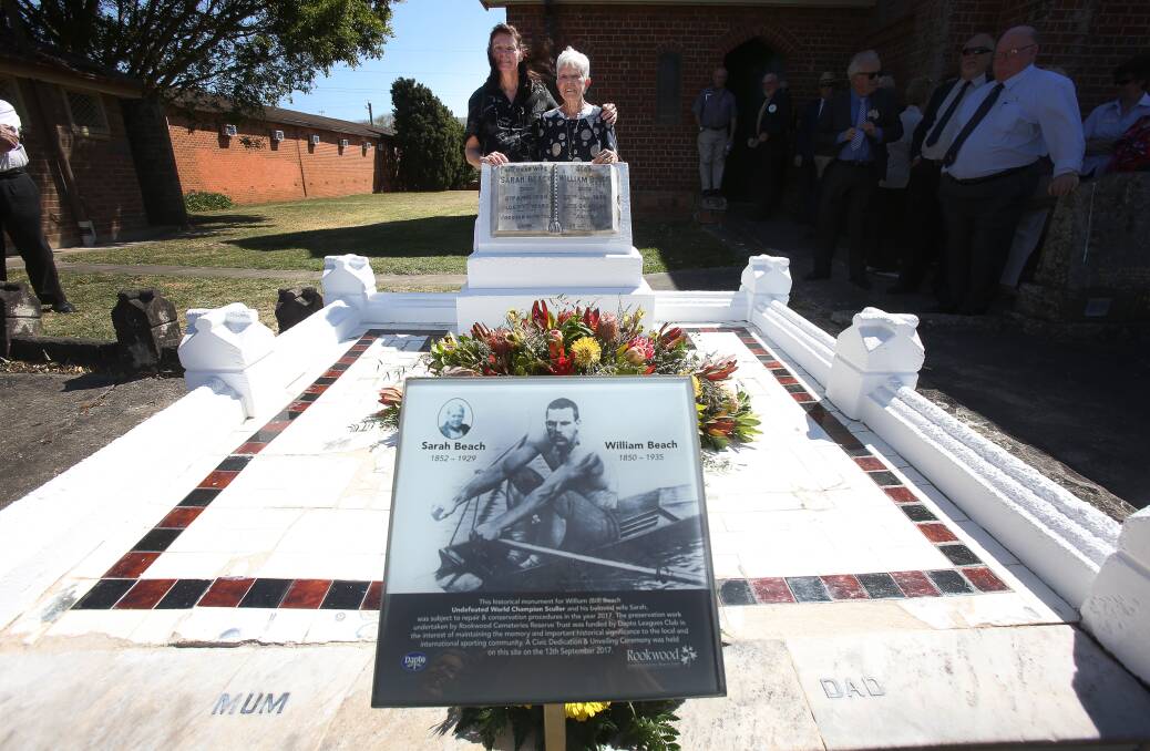 Dapto Leagues Club remembers history: Yvonne Downes and Pam Chie with the restored William Beach Memorial at St Luke’s Brownsville. Picture: Robert Peet


