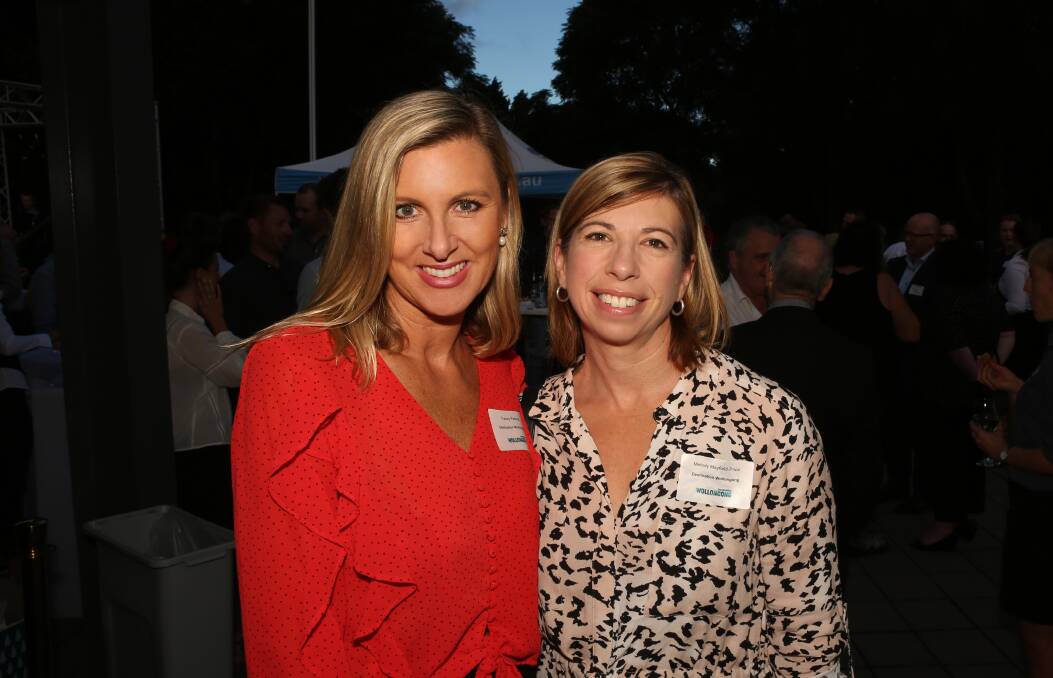 Important work: Destination Wollongong's Tracey Pascoe and Melody Mayfield-Price at Thursday night's partner function at BlueScope Steel visitor information centre. Picture: Greg Ellis.

