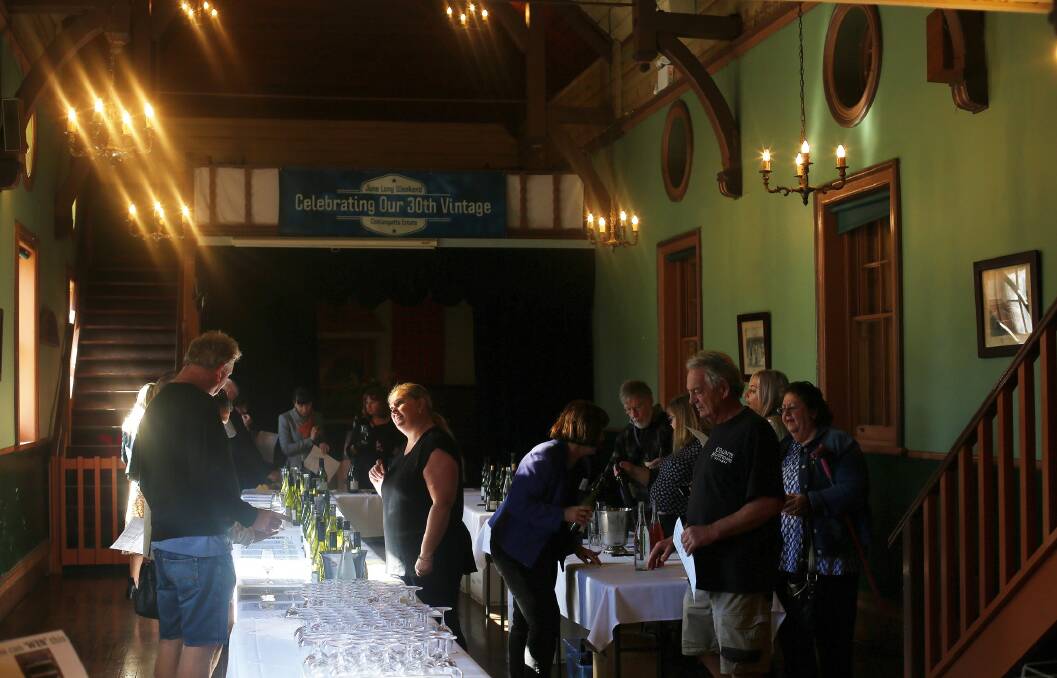 Fine wine: Hundreds of people sampled local product with vertical wine tasting in The Great Hall at Coolangatta Estate. Picture: Greg Ellis.

