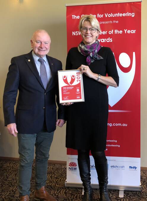 Volunteer recognition: Wollongong Lord Mayor Gordon Bradbery with Illawarra Volunteer of the Year Nicki Bowman.
