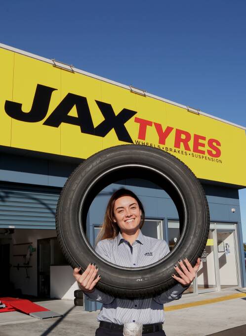 Turning passion into business: Bec Bull has thrown herself right into the tyre business opening a new workshop on the top car park at Warrawong Plaza.



