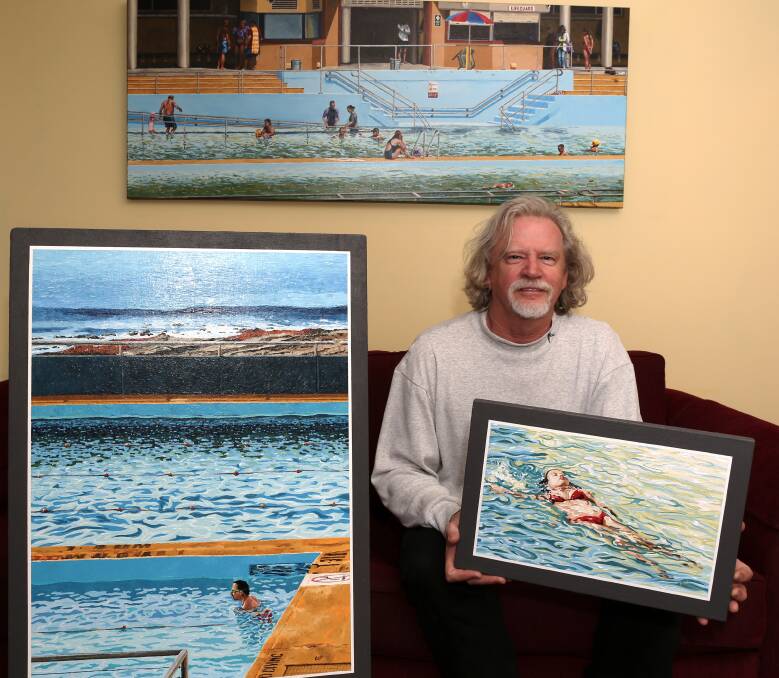 Warming up winter: Donald Keys at home on Sunday with some of his Defying Winter series. Picture: Greg Ellis.

