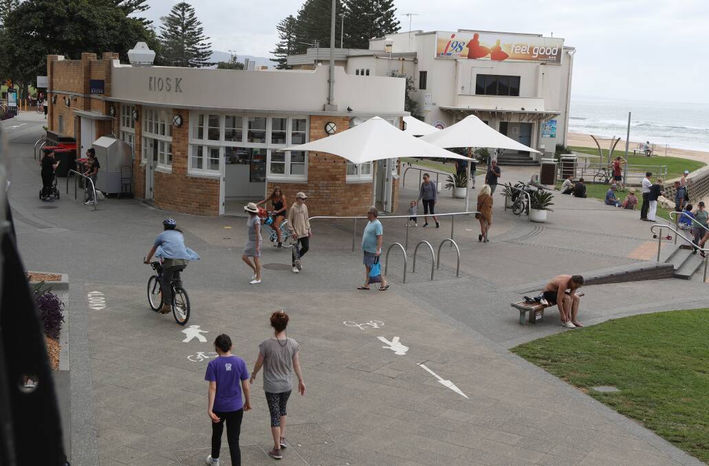 Better social distancing at 11am on Monday: Wollongong residents are being reminded to maintain good social distancing practices after a busy weekend at North Beach. Picture: Robert Peet. 