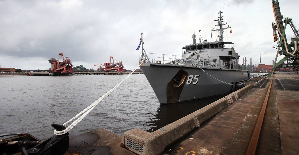 Rare visit: Royal Australian Navy minehunter HMAS Gascoyne berthed at near the grain terminal at Port Kembla at 11am on Friday. Picture: Sylvia Liber.