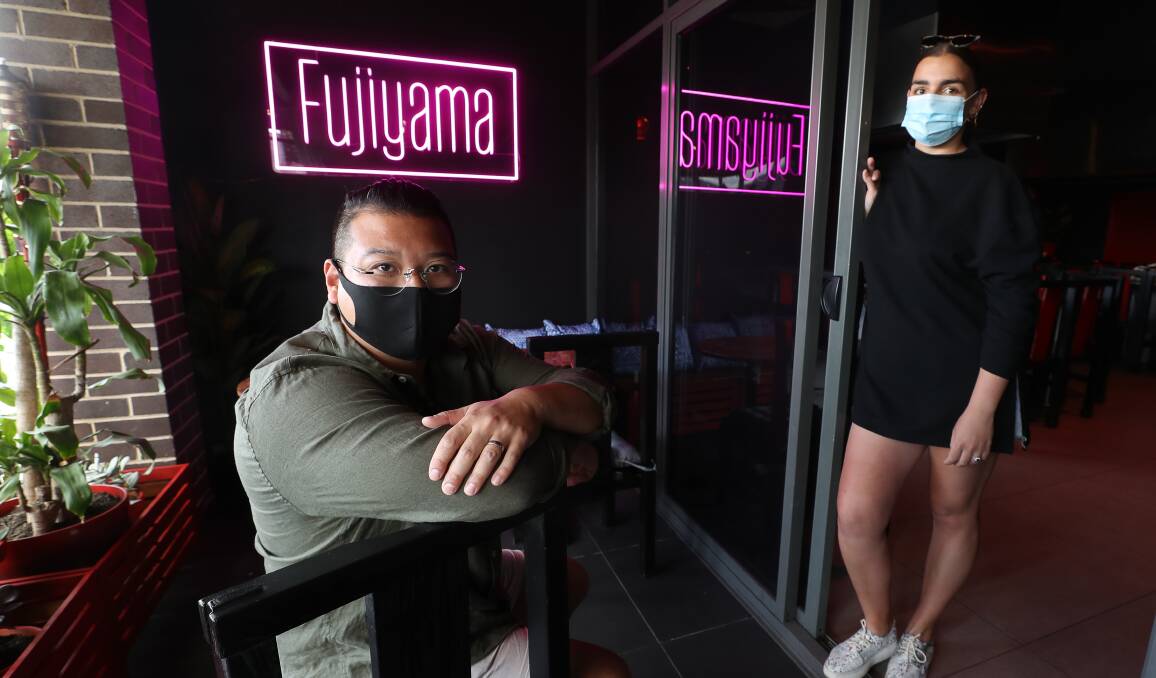 Turning Japanese: Arron Choi and Barbora Sterba Choi prepare to reopen Fujiyama Teppanyaki Restaurant for dine-in customers on Friday. Picture: Robert Peet.