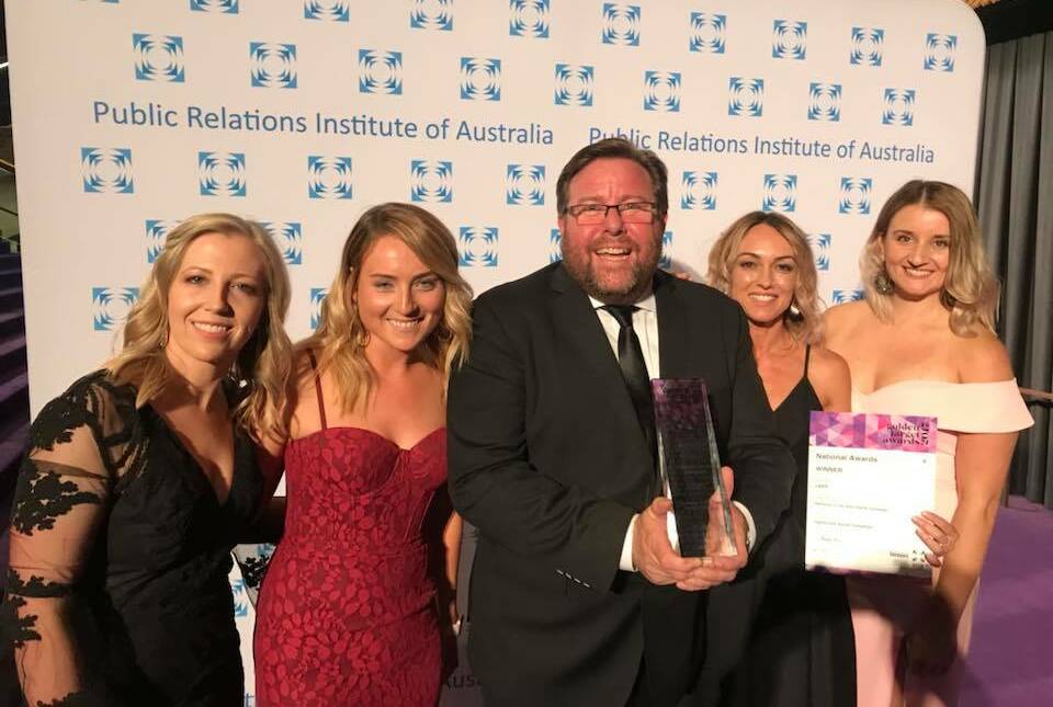 WINNING WOLLONGONG CAMPAIGN: LBPR's Lauren Fellowes, Tabitha Galvin, Lisa Burling and Tammy Potter accept their award from Shane Jacobson at Sydney Opera House on Thursday night. Picture: LBPR

