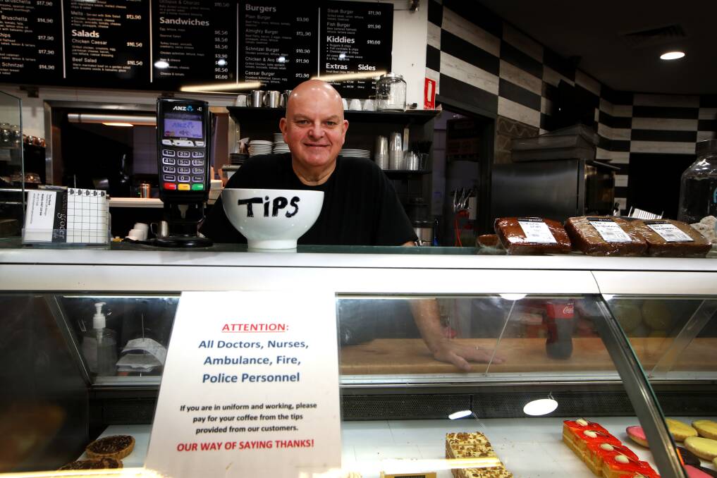 Thank you health and emergency workers: Country Grocer cafe manager Tony Neale and his customers have been giving out free coffees to those on the front line. Picture: Sylvia Liber. 