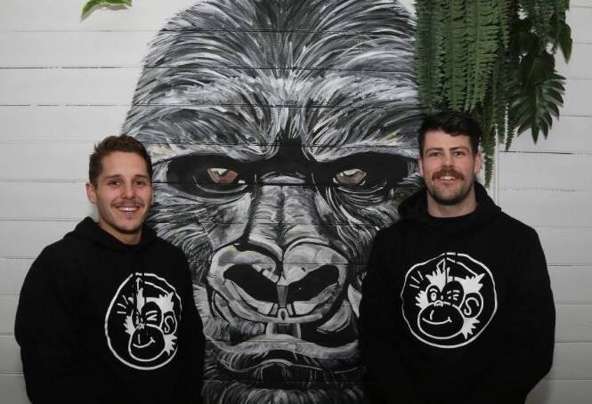 Winners grin: Jack Alexander and Taylor Hudson at The Hungry Monkey in Kiama after the eatery was named Business of the Year in 2017. Picture: Greg Ellis.
