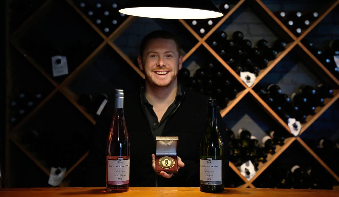 Some good news: After a summer of smoke followed by COVID-19 Coolangatta Estate cellar door manager Ben Bishop was happy to receive the largest ever vintage of Rosé Frizzante and a major new award for the 2010 Savagnin. Picture: Greg Ellis. 