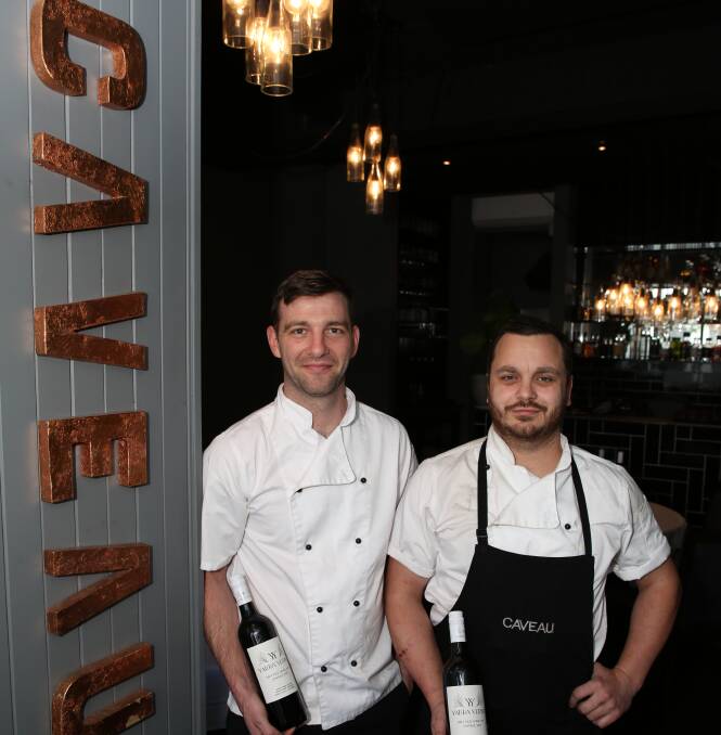 Good things will come to those who can wait: It will be a little while yet before Thomas Chiumento and Simon Evans begin welcoming people at the door to Caveau Restaurant in Keira St, Wollongong. Picture: Greg Ellis. 