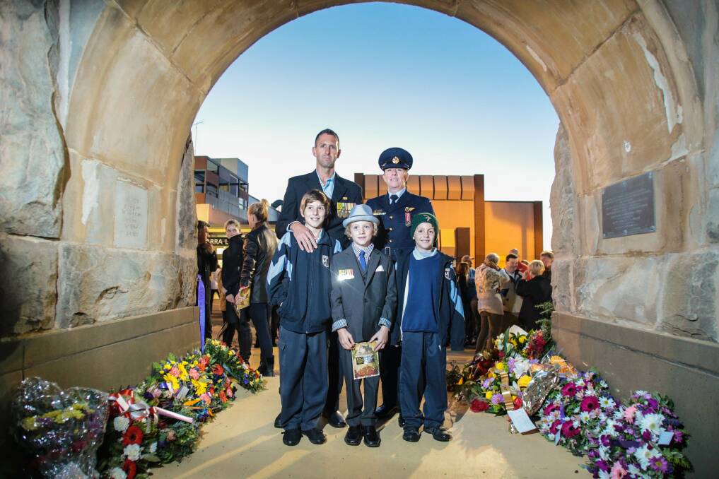 Family unit: Sgt Adam Campbell, Sgt Simone Campbell and sons Deklan, Aiden and Regan Campbell at the ANZAC Day Dawn Service in Wollongong on April 25, 2015. Picture: Adam McLean. 
