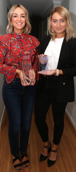 National win: LBPR's Lisa Burling and Tabitha Galvin with their Australian and NSW Public Relations Institute of Australia awards. Picture: Greg Ellis.

