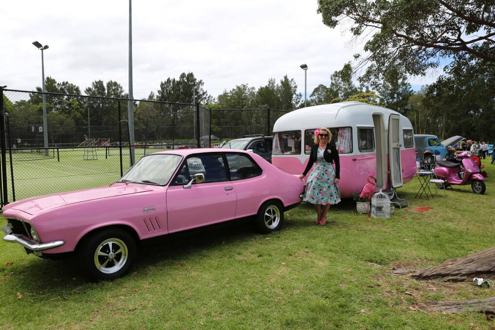 Pretty in pink: Monica Squires with her 1972 GTR XU1 Torana, 1960 Sunliner caravan and Vespa camping set-up at the car show in 2018. Picture: Greg Ellis. 