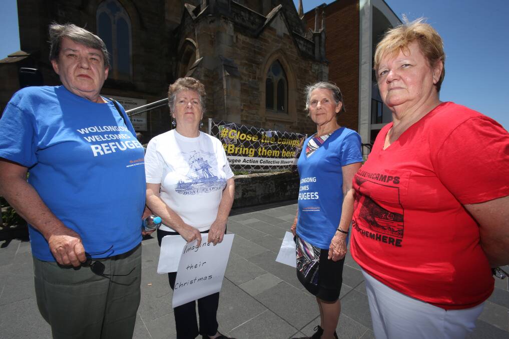 Rally: Margaret Perrott, Cherry Hardaker, Joy Donovan and Denise Nichols during a Human Rights Rally in Wollongong Mall: Pic: Robert Peet

