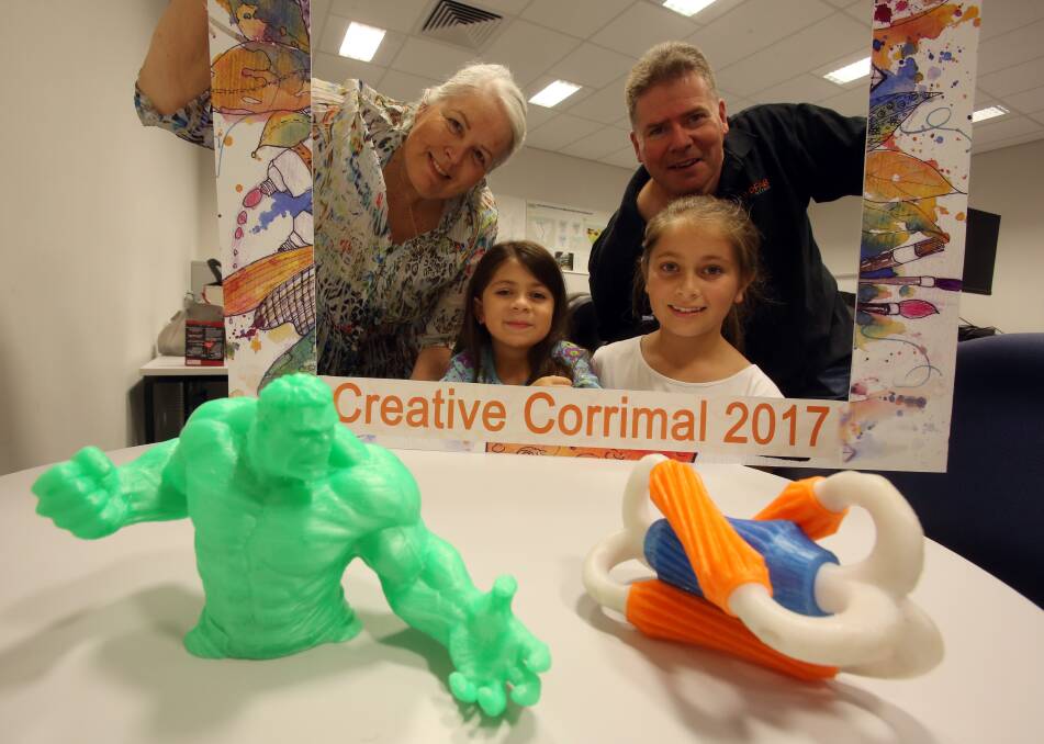 ARTS FESTIVAL: Creative Corrimal's Valerie Hussain, Modfab's Ben Roberts and Keira and Jade Boultwood with some 3D printed creativity that will form part of a big Saturday in the Corrimal community. Picture: Robert Peet.
