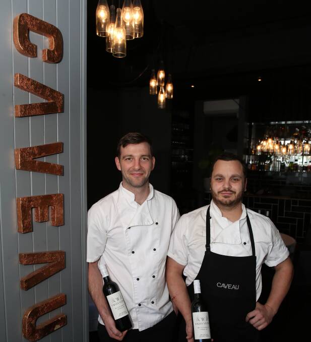 Hatted chefs: After taking over the popular Wollongong restaurant several years ago Tom Chiumento and Simon Evans have continued Caveau's long run of success winning hats in the Good Food Guide. Picture: Greg Ellis.
