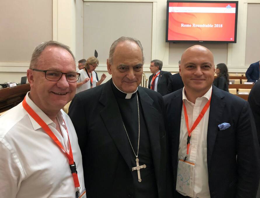 Global forum: UOW deputy vice-chancellor Professor Alex Frino (right) with Anglo American chief executive Mark Cutifani and Bishop Marcelo Sanchez Sorondo at the Vatican for a Global Roundtable in Rome.
