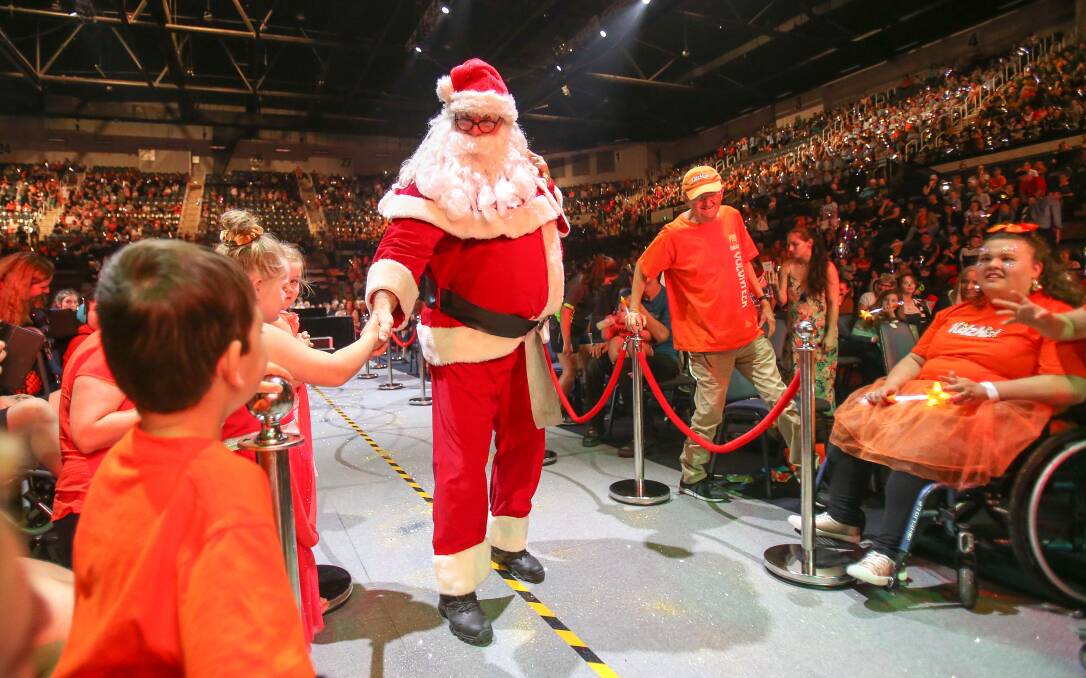 Santa Claus is coming to town: The climax of the 15th annual KidzWish Christmas Party for 4300 Illawarra and South Coast children as Santa graced the stage.

