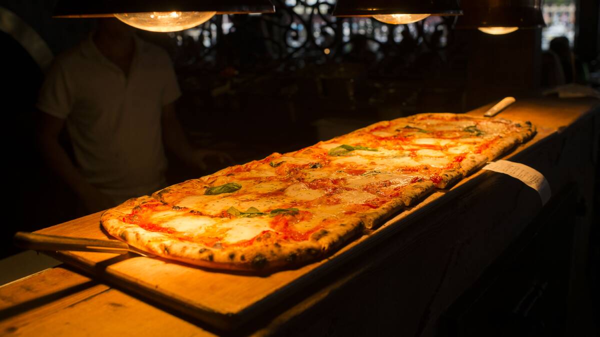 Criniti's Restaurant still interested: Illawarra diners may still soon be able to take on the three metre pizza challenge in Wollongong.
