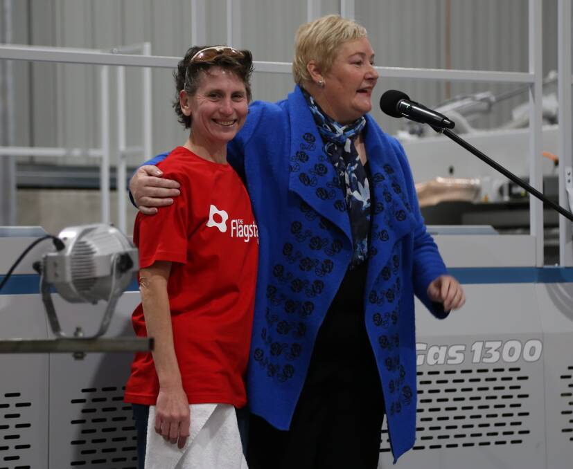 Moving moment: Gilmore MP Ann Sudmalis acknowledges her former fudge factory employee Cristine Suffolk on stage. Pictures: Greg Ellis.

