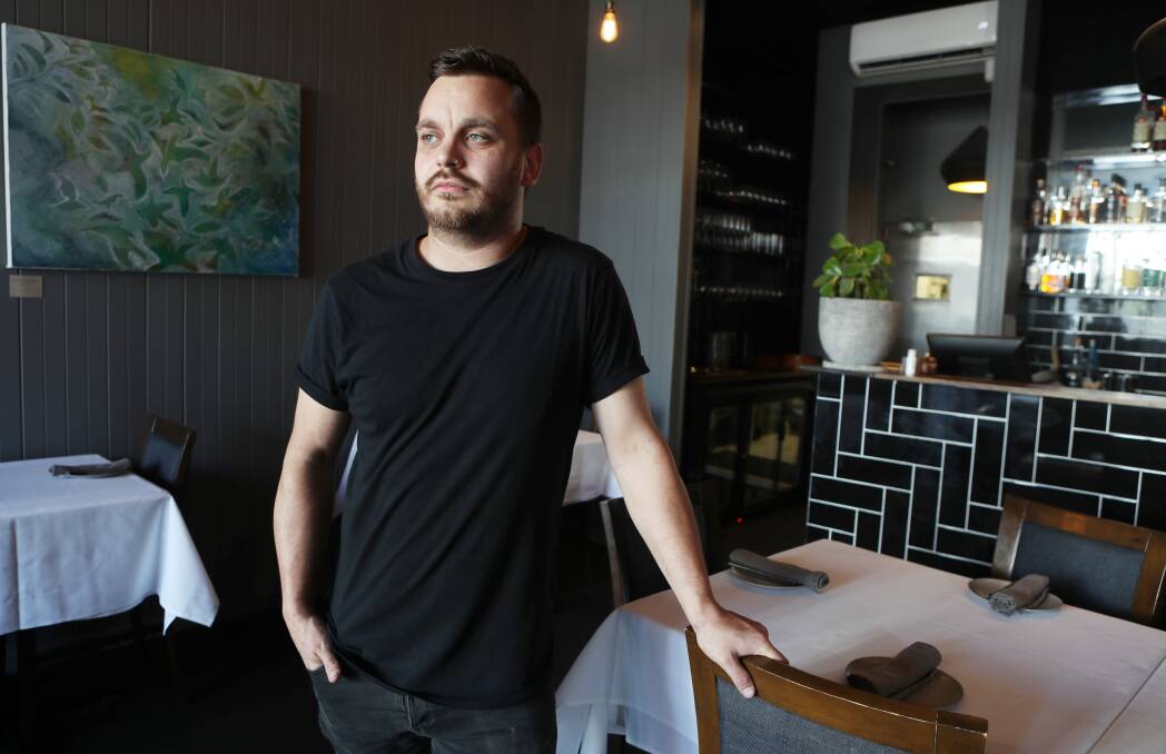 Concerns: Caveau co-owner Simon Evans is concerned about the future for local eateries and other businesses. Picture: Robert Peet. 