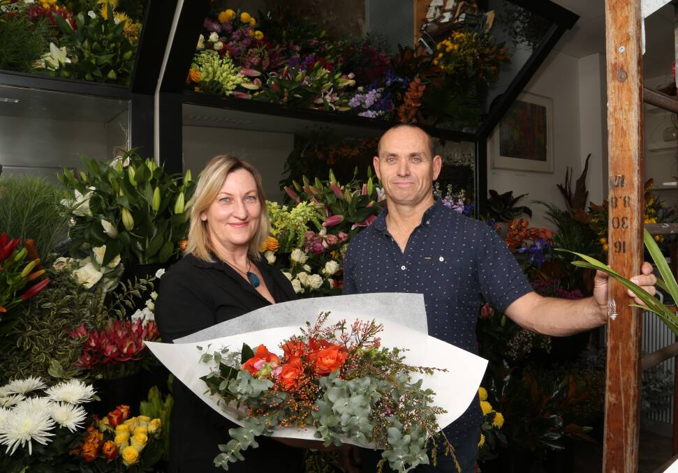 Changing business: Flower siblings Chris and Paul Briscoe-Hough at Wollongong Flowers in Corrimal Street. Picture: Greg Ellis.

