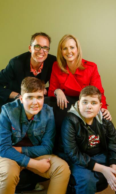Helping families with autism: Brad and Jenn Ratcliffe with their boys Cameron and Coby who are loving the app their parents have developed. Picture: Adam McLean..