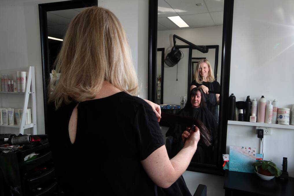 Grateful: Jessica Barry, of Anaston Hair & Beauty, enjoys having more time to work on client Majella Thickett's hair. Picture: Sylvia Liber. 