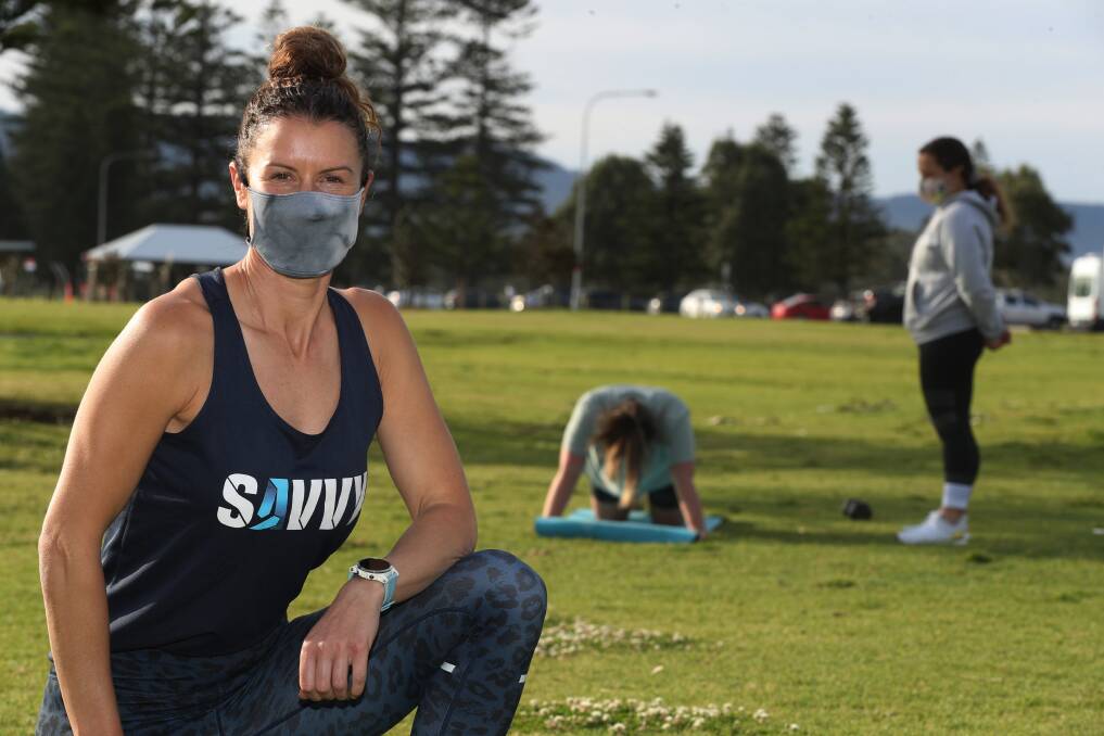 Personal training: Savvy Fitness owner Angela Saville looks on as a one-on-one personal training session is conducted at Stuart Park. Picture: Robert Peet.