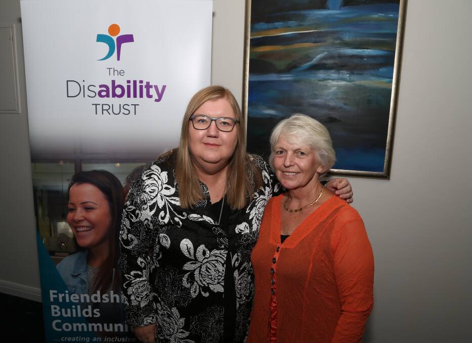 Friendship builds communities: Margaret Bowen and Joanne Babb who was on the interview panel for the CEO's job at The Disability Trust in 1987. Picture: Greg Ellis.

