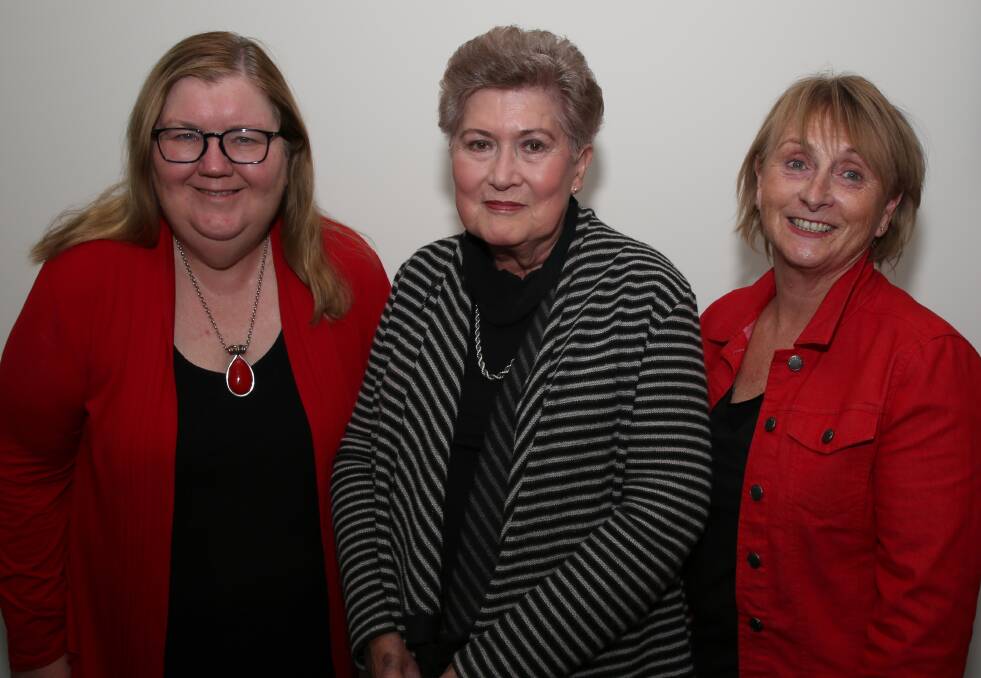 Man who made a difference: The Disability Trust CEO Margaret Bowen with Jan May and Glenda Pearce. Picture: Greg Ellis.
