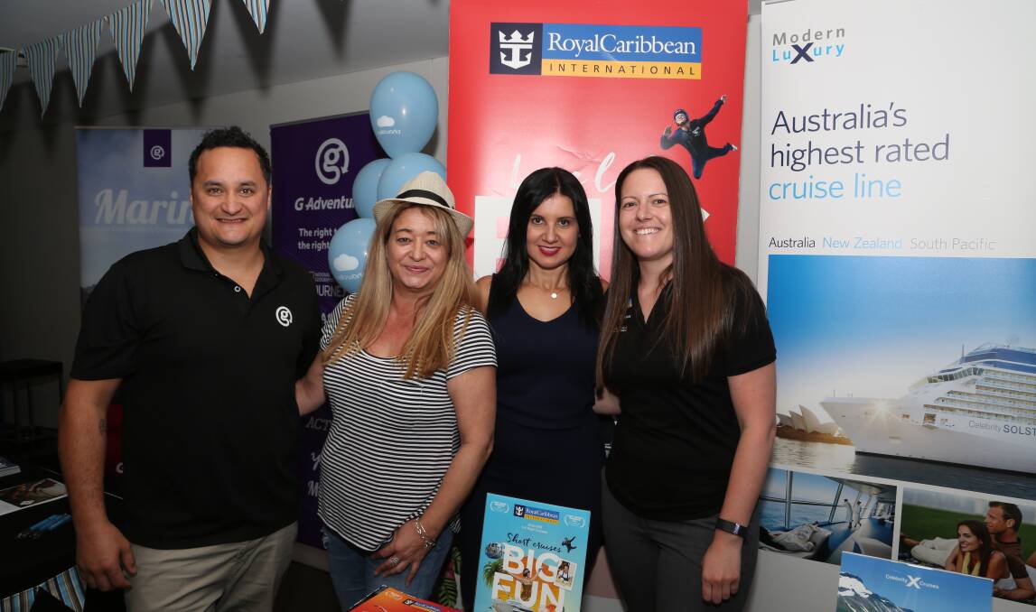 Cruise control: Some of the Helloworld team during a free cruise ship expo at Wollongong Surf Club this month. Picture: Greg Ellis.
