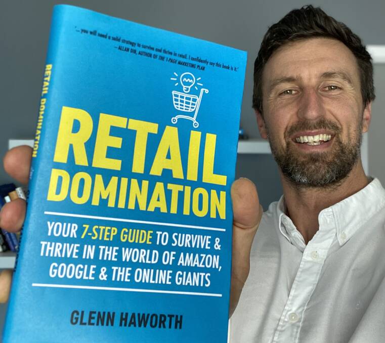 Author: Glenn Haworth with his new book about tips to survive in retail..
