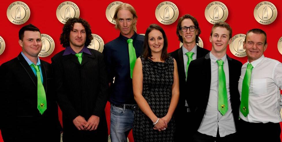 Winning Illawarra business: The Bohmer’s Tree Care team after winning the 2015 Local 
Business Award for Business Trades and Services. Picture: Supplied
