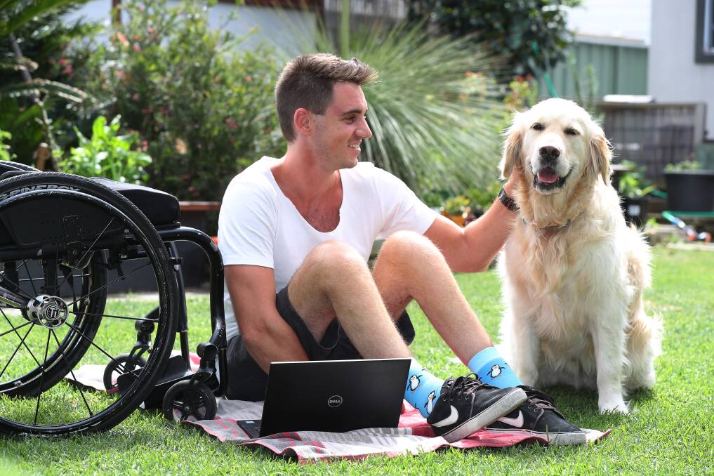 Cure quest: Dean Martelozzo and supportive canine friend Zeke. Picture: Robert Peet.