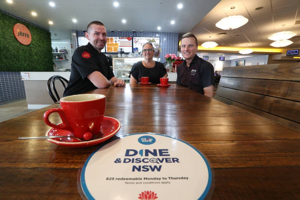 Dine & Discover: Rob Kerr, Jacque James and Allan Kerr are seeing more vouchers used every day at Jaffa Bistro in Corrimal. Picture: Robert Peet.