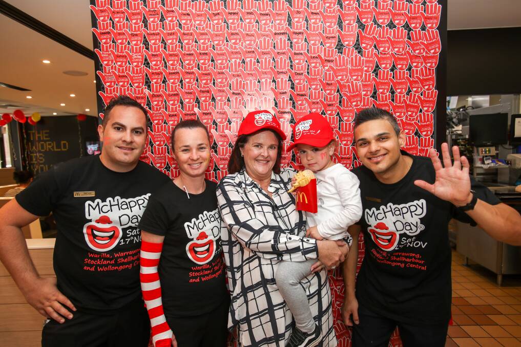 McHappy Day for sick and injured kids and their families: Mehmet Agdiran, Michelle Steain, Anna Watson, Olivia Mitrevski and John Dwarte at Warilla McDonald's during McHappy Day. Picture: Adam McLean.



