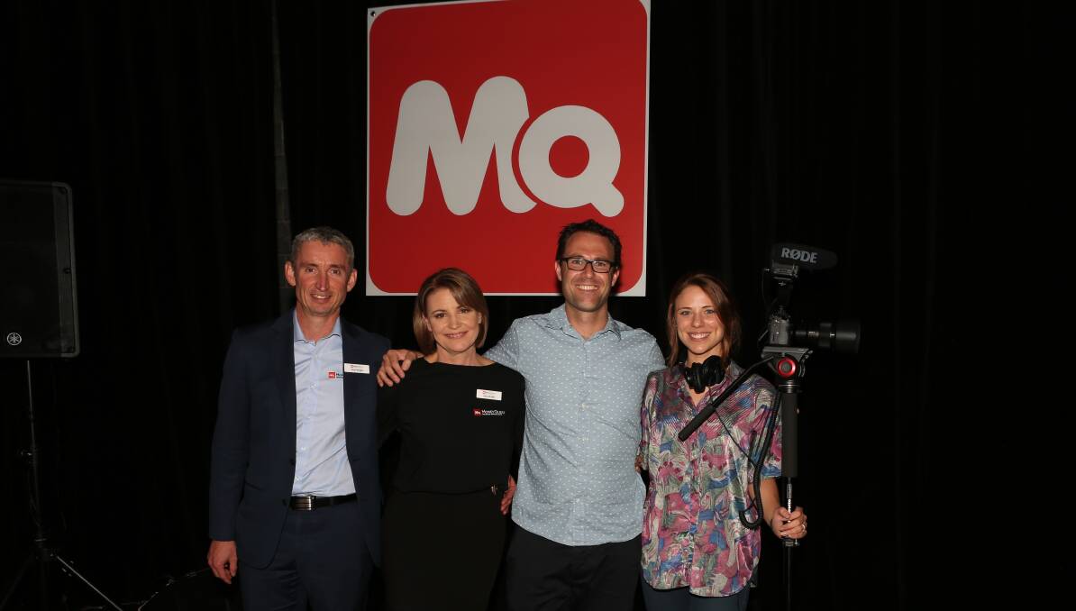 Support grows for charity: Paul and Julie Wright, of MoneyQuest, with Mark Dombkins and Elise Jensen, of Forever Projects in Wollongong. Picture: Greg Ellis.


