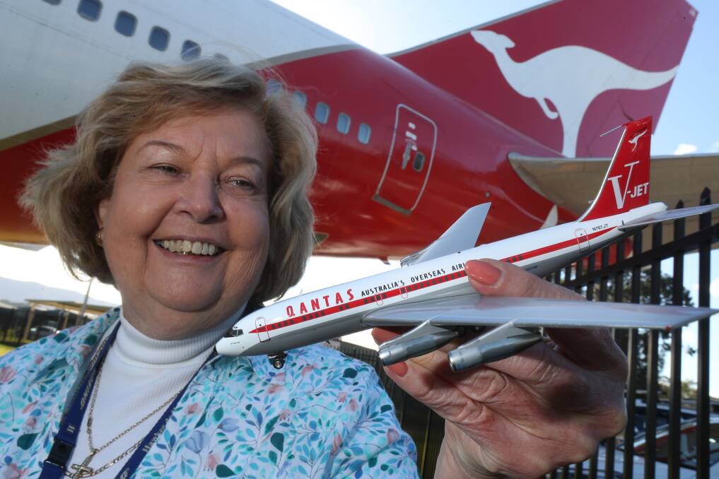 Flying high: HARS vice president Maureen Massey with a model of John Travolta's Boeing 707. She is responsible for coordinating the arrival of the real thing with the movie star on board in late November. Picture: Robert Peet.
