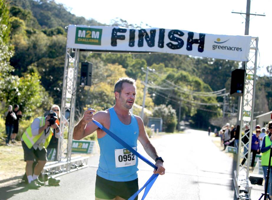Fine finish: Jeff Chaseling after crossing the finish line first in the M2M Challenge. Picture: Sylvia Liber.
