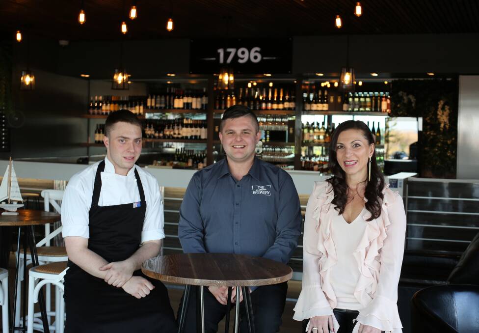 History remembered at new wine bar: Calum Howlett, Mitch Bathis and Lana Micevska Sereno at the revamped 1796 at The Brewery. Picture: Greg Ellis. 
